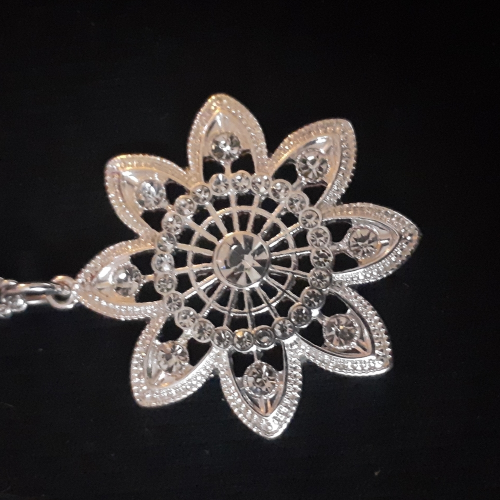 Sparkly pendant on long chain. - Picture 2 of 6